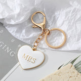 Oh Saucy South Korea Simple Personality Alloy Black And White Peach Heart Keychain